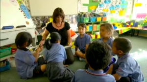 Teacher with students in the classroom