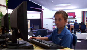 Student using a computer.