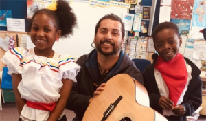 The children enjoy wearing their Colombian dancing costumes.