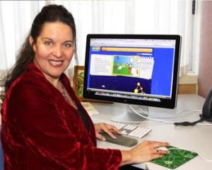 Teacher using computer.
