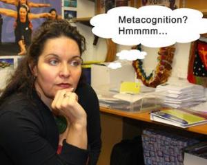 Teacher with thought bubble saying "metacognition".